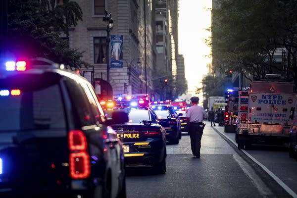 Gunman kills 4, including police officer, in shooting at New York City office tower