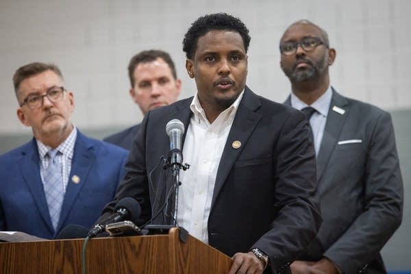 A man speaks at a press conference