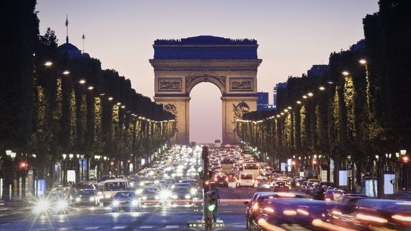The Arc de Triomphe  along the Avenue des Champs-Elysees in Paris. 