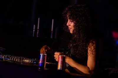 sophia eris performing a dj set on stage