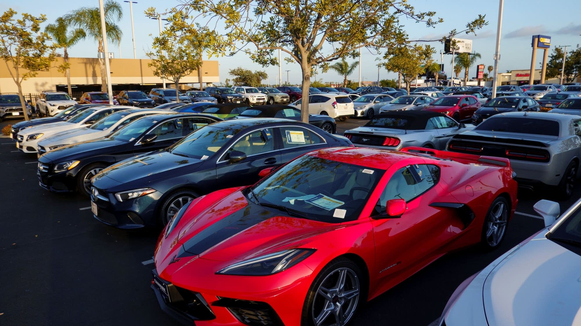 Car prices continue to rise. Auto lenders compensate with long-term loans