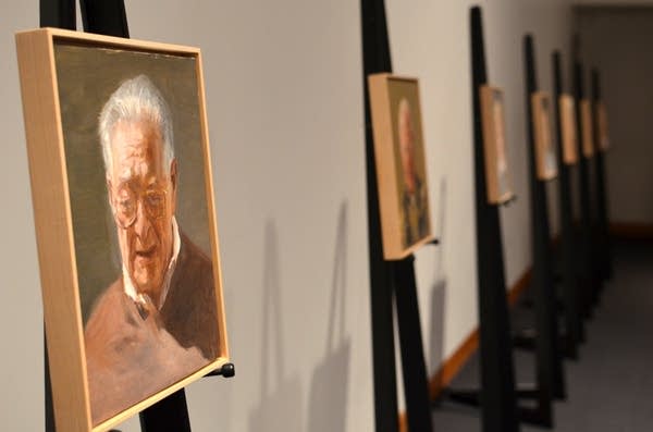 Portraits of nine Holocaust survivors