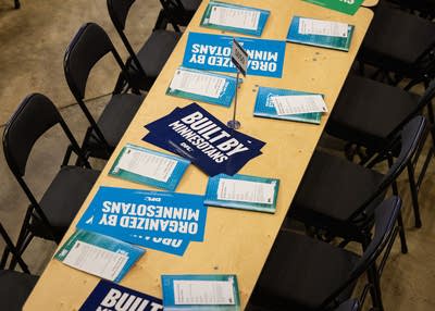 Political signs laid out on a table