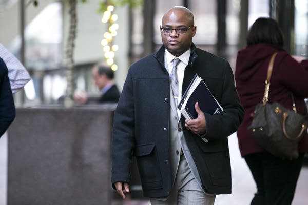 Efrem Hamilton walks through the Hennepin County Government Center