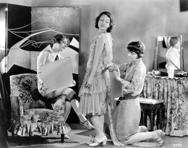 A dress fitting circa 1930, when synthetic fabrics were new to the market.