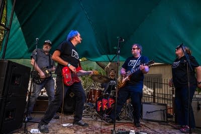 The Heavy Sixers performing on stage