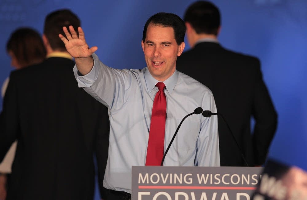 Walker greets supporters
