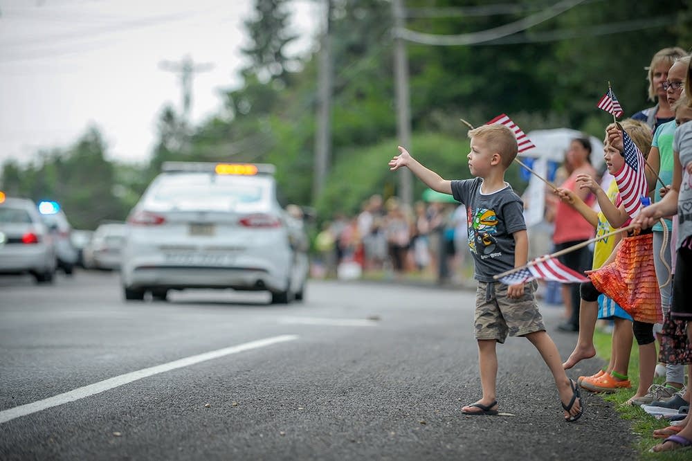 Children watching the procession