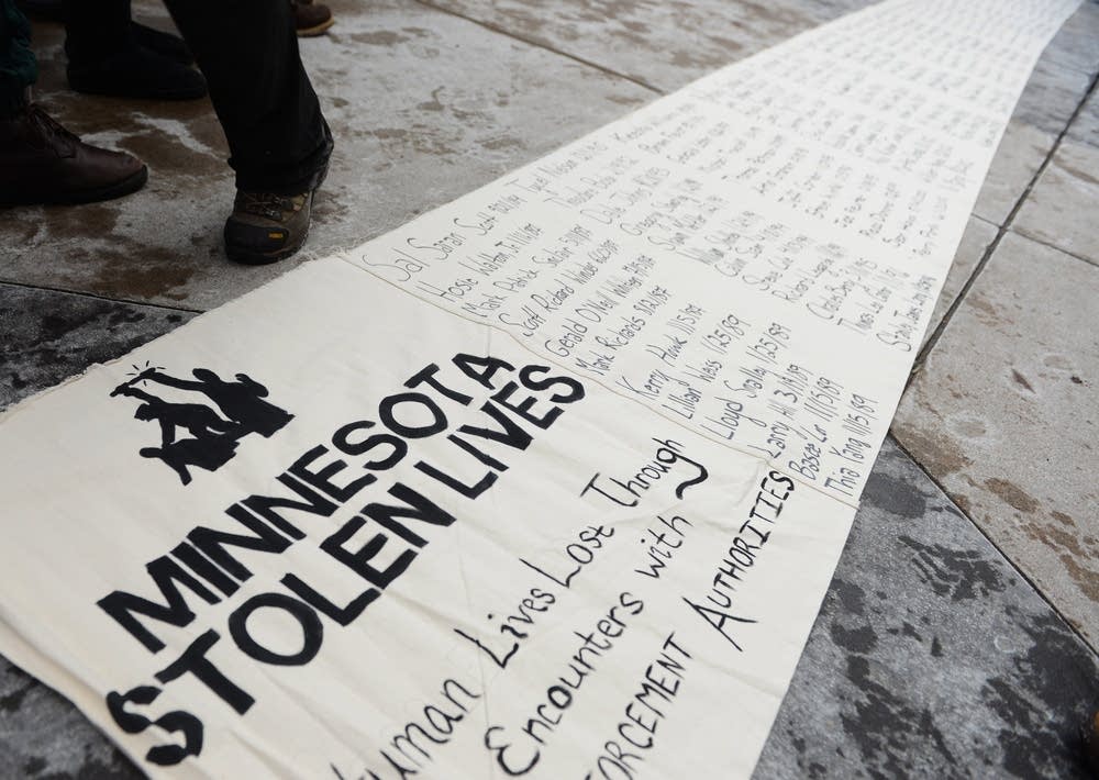 A sign is rolled out in front of Coffman Union.