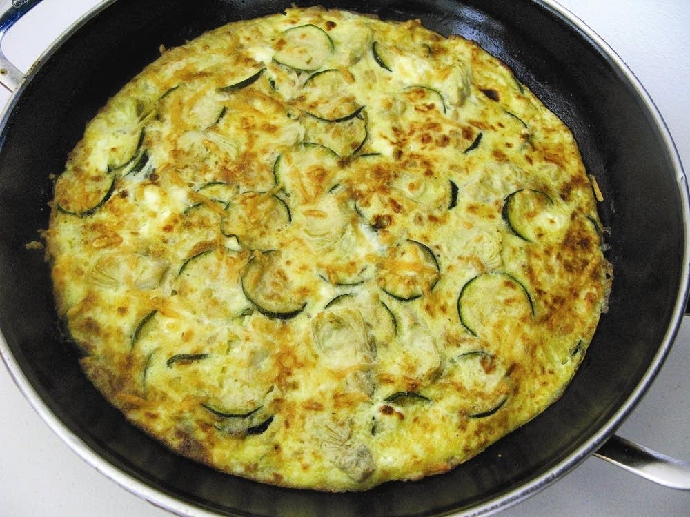 Caramelized Onion Frittata with Artichoke Hearts, Zucchini and Goat