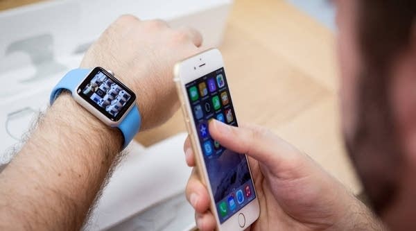 Apples reports fourth-quarter earnings Tuesday, and Wall Street will be looking for hints as to how the Apple Watch is selling.
