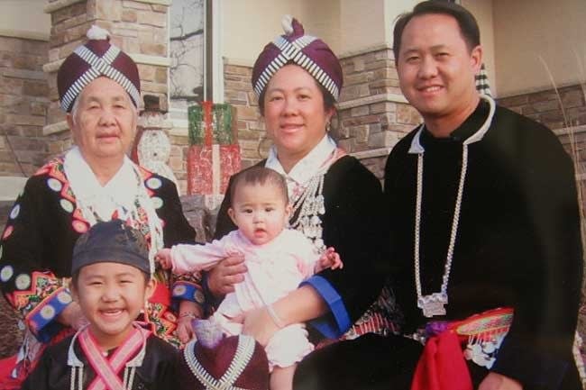 Mee Moua and her family
