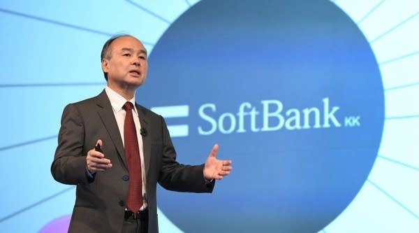SoftBank Group Corp Chairman and CEO Masayoshi Son gestures as he delivers a speech during a press briefing to announce the company's financial results in Tokyo on Feb. 7, 2018.
 
 
 