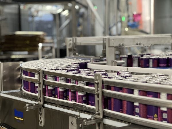 THC drinks move on conveyer belt