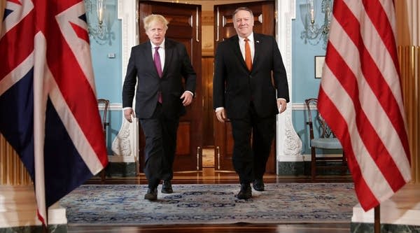 British Foreign Secretary Boris Johnson (L) and U.S. Secretary of State Mike Pompeo arrive for a photo opportunity ahead of meetings at the U.S. State Department's Harry S. Truman headquarters building May 7, 2018 in Washington, DC. Johnson is in the United States in part to argue for the Trump Administration to continue to be a party to the 2015 Iran nuclear deal.