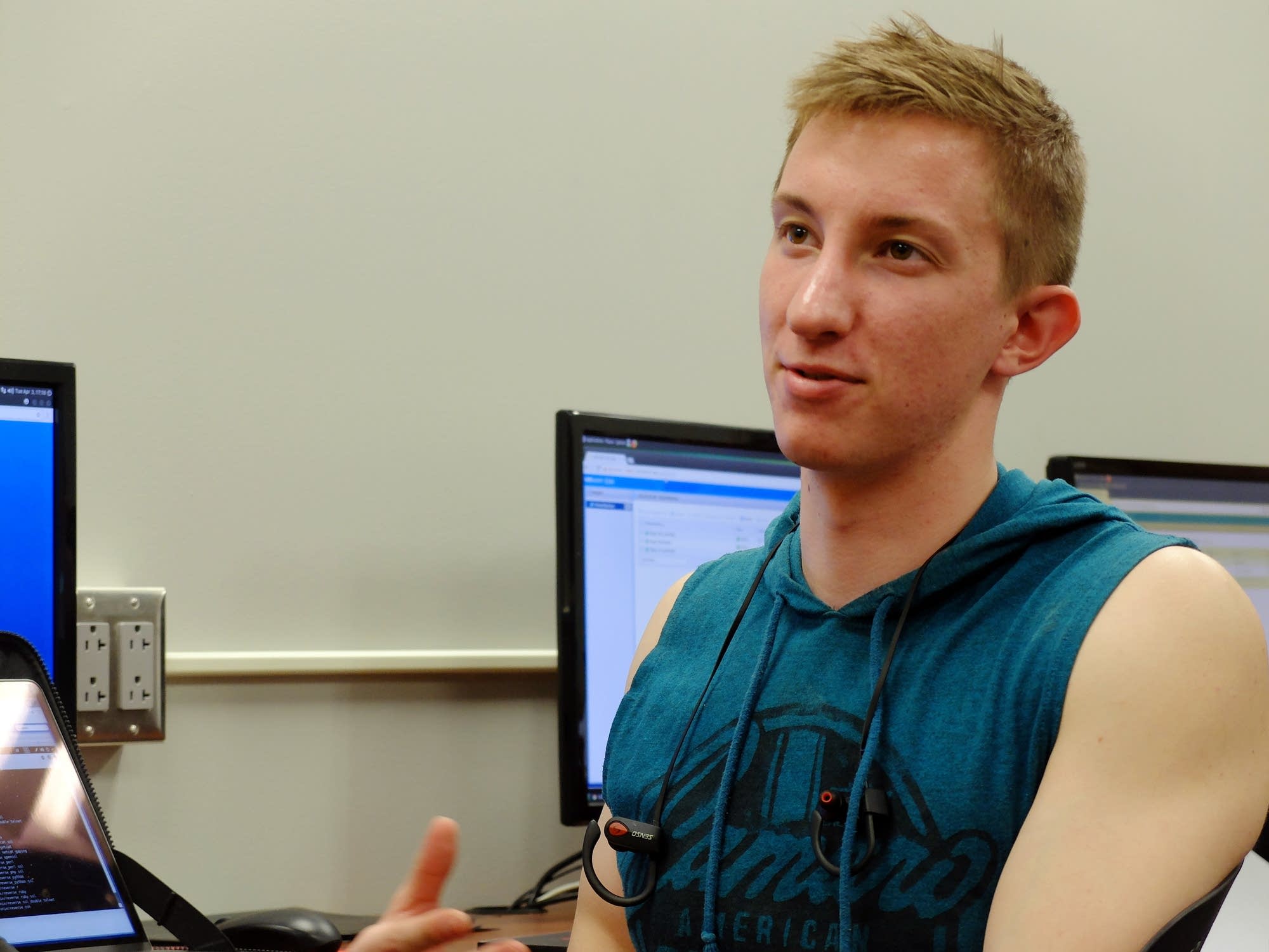 NDSU junior Isaac Burton asks a question during a cyber security class.