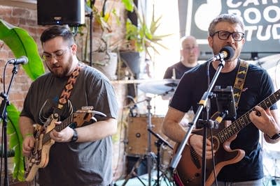 A band performing in a small music venue