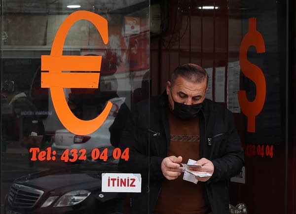 A sales rep at Apple in Istanbul said customers are thinking about purchasing electronics not just to use, but also to store value.