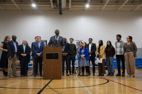A man speaks at a press conference
