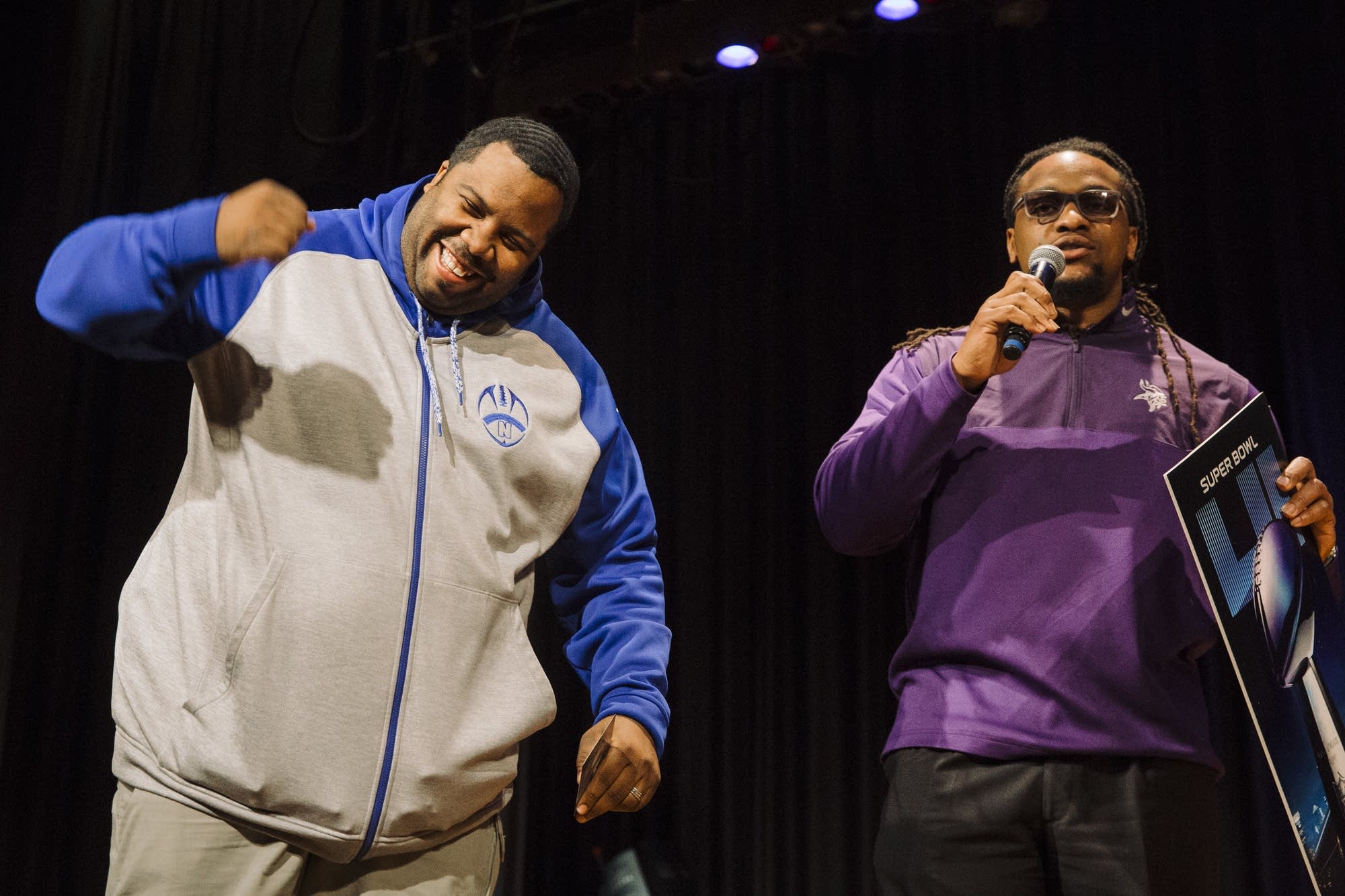 Minneapolis North Polars head coach Charles Adams fist pumps.