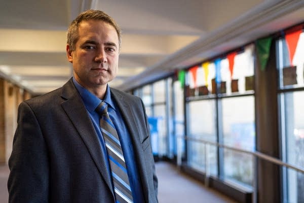 Maxfield Elementary School principal Ryan Vernosh stands for a portrait