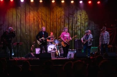 Seven musicians play onstage at First Avenue.