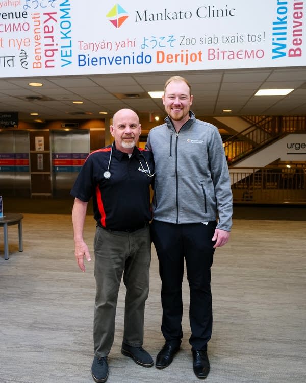 Two people posing for photo at Mankato Clinic