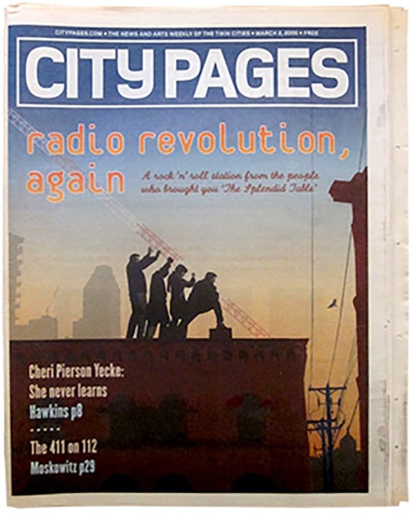 City Pages cover featuring people erecting radio tower.