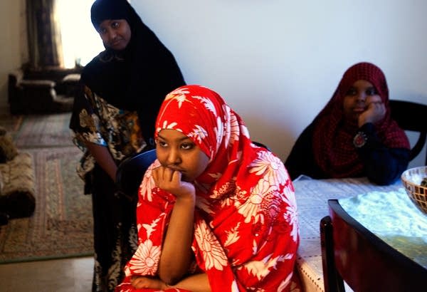 Maryan Yusuf watches her mother cook