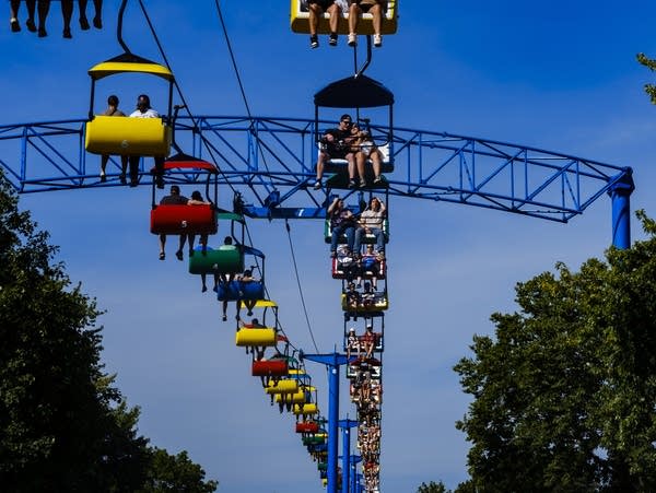 People ride the Skyride