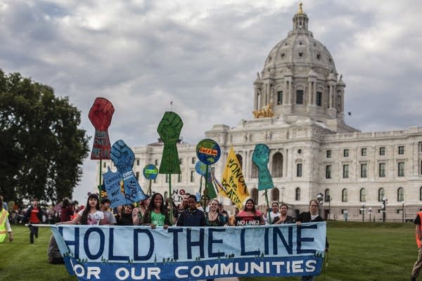 Protesters begin to march to Intercontinental Hotel in St. Paul.