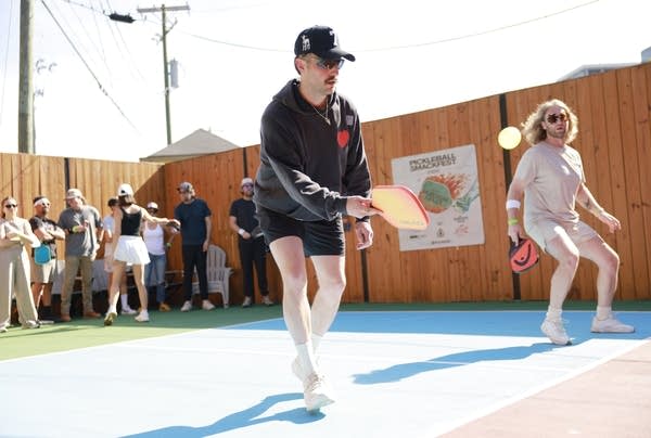People playing pickleball