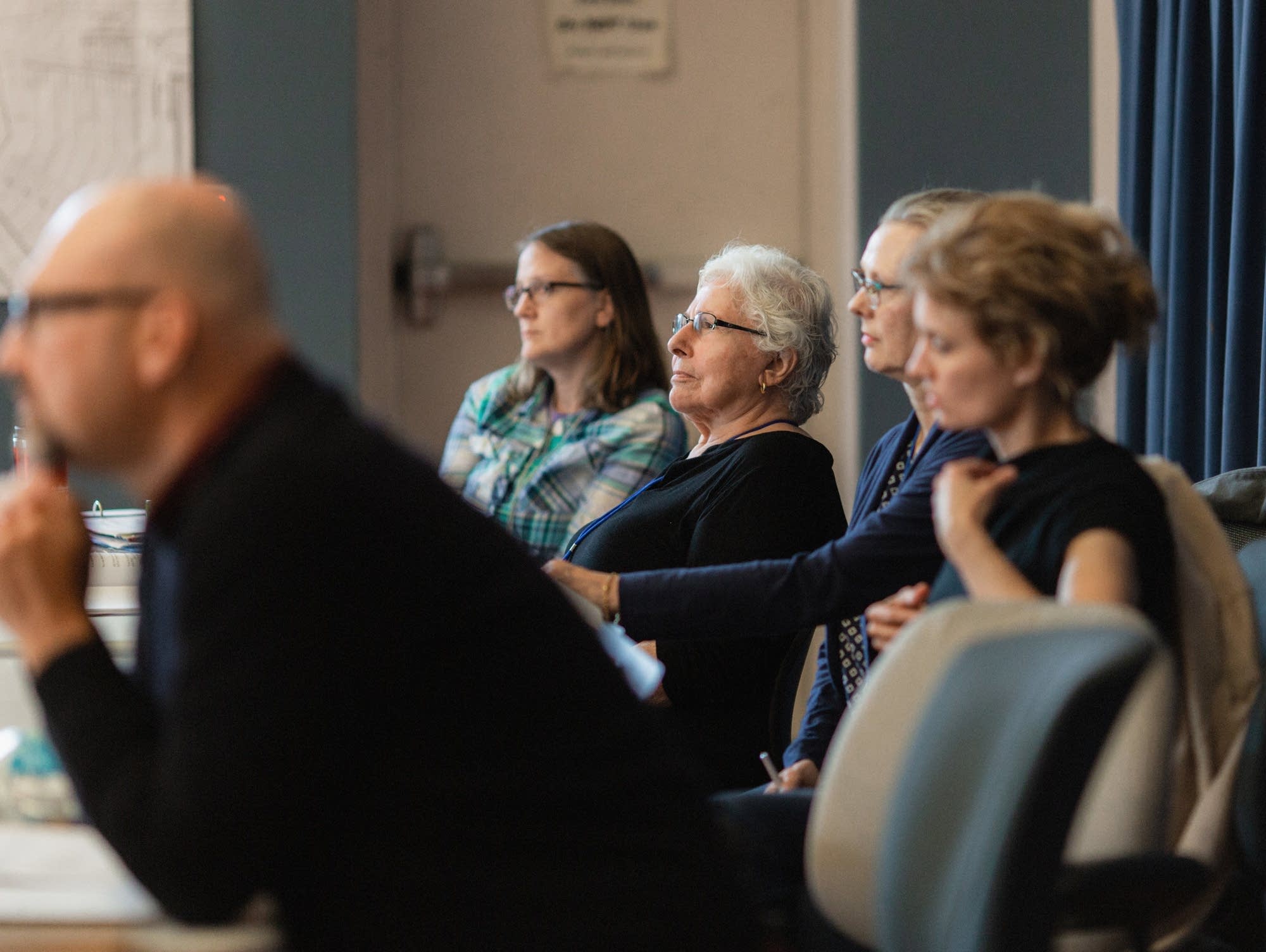 Playwright Barbara Field (center) surrounded by the creative team.