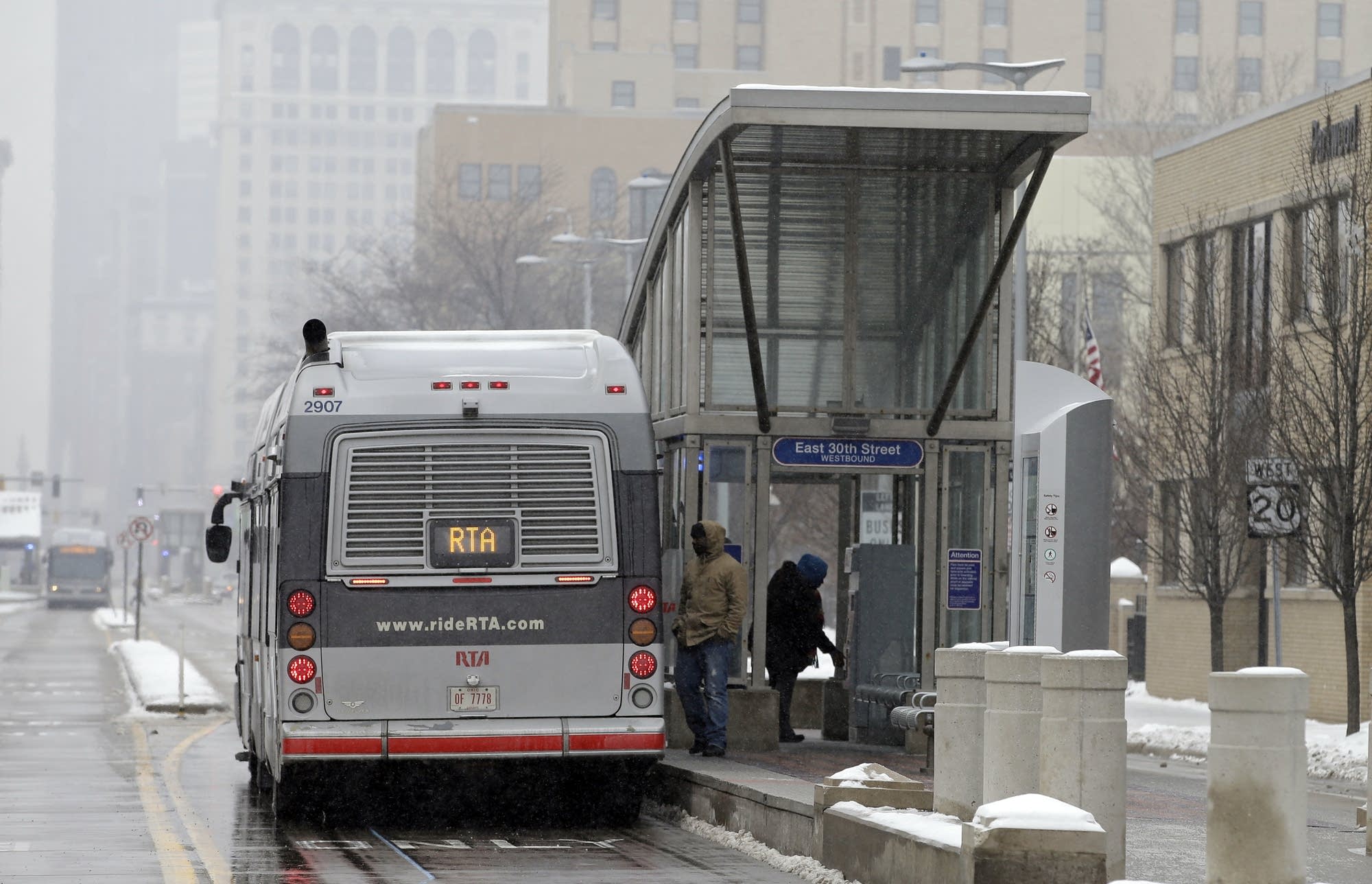 A rider boards a Cleveland Regional Transit Authority HealthLine bus.