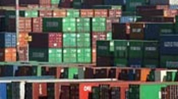 Shipping containers stacked on docks in the Port of Los Angeles in San Pedro, California.