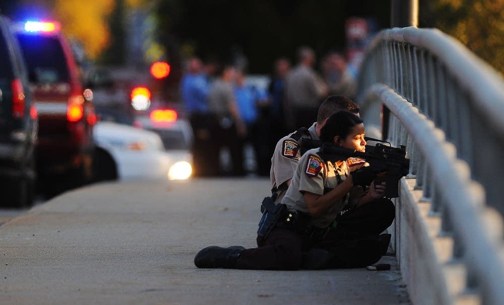 Officers on Penn Ave. bridge