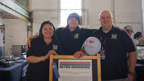 From left to right, Retro Roadshow CEO Sarai Dunsany poses with her son, Rhyal, and husband and co-founder Huxley at the 2024 Bay Area Maker Faire.