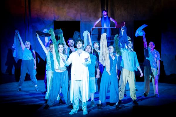 People perform on stage