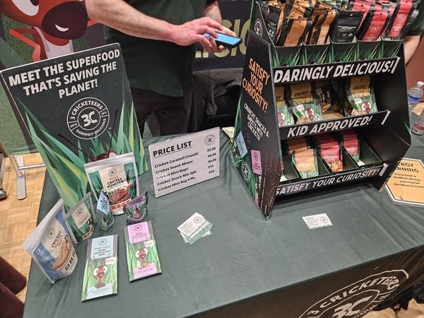 Packaged cricket snacks on a table