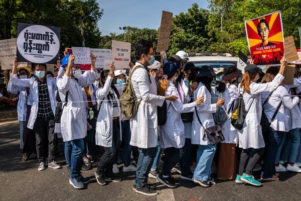 Myanmar's doctors are torn between caring for their patients and protesting against the government.
