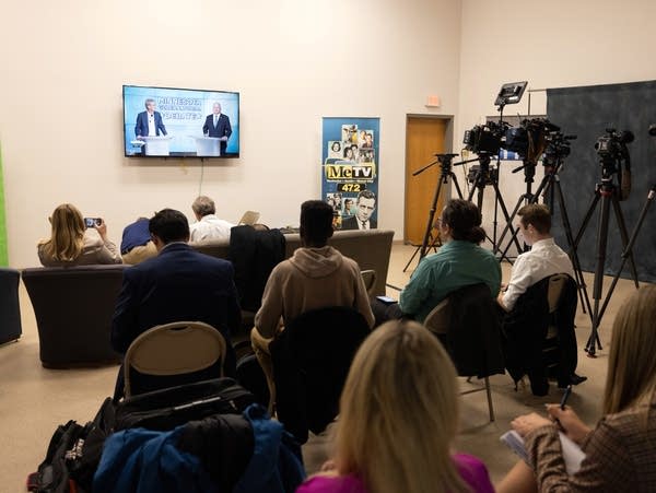 Local media watch Governor Tim Walz  and challenger Scott Jensen