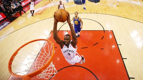 Serge Ibaka of the Toronto Raptors dunks the ball against the Golden State Warriors during Game One of the 2019 NBA Finals in 2019 in Toronto, Canada. 