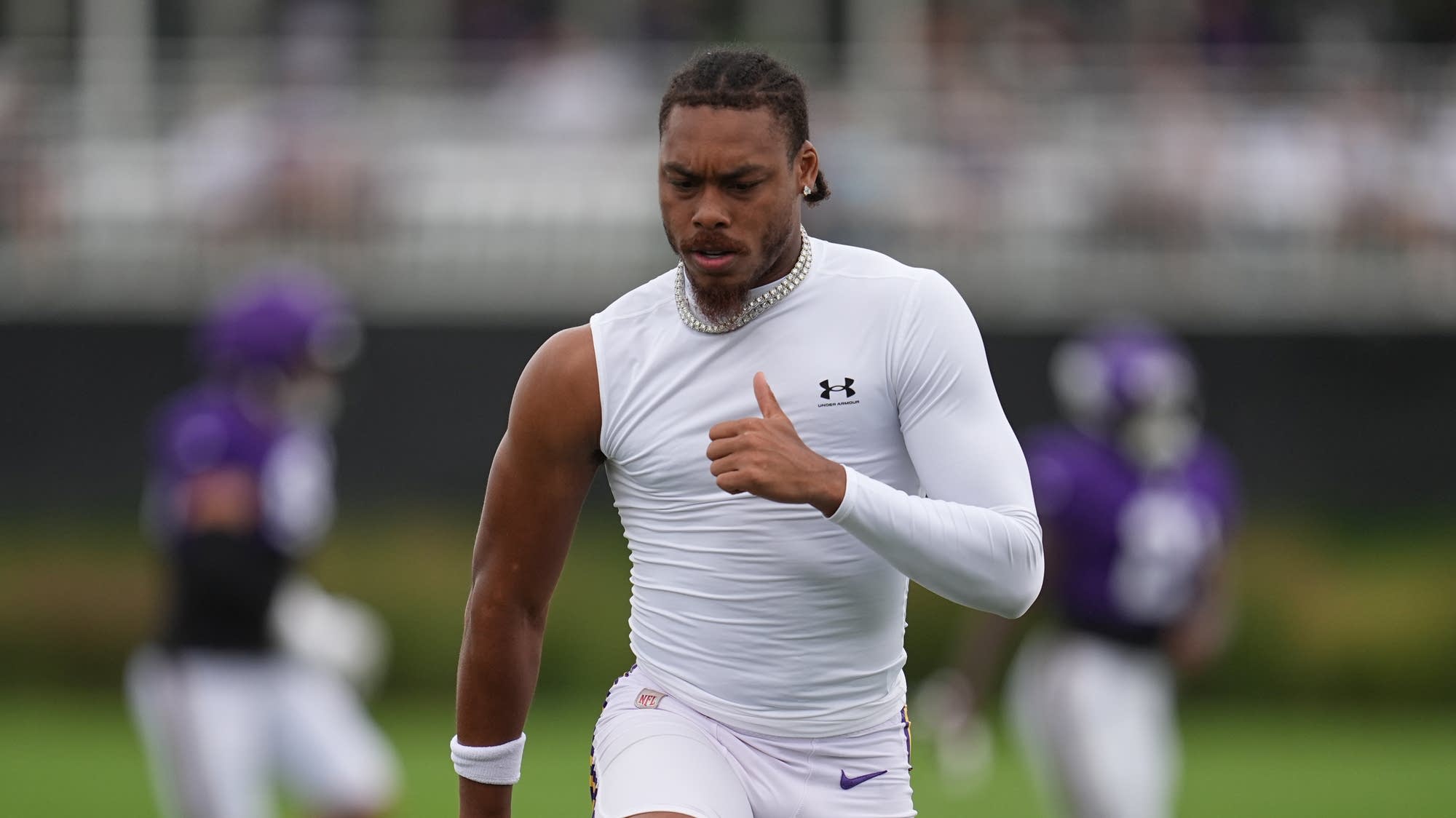 Vikings receivers savor tips from Randy Moss, get stiff tests from Ravens defense at joint practices