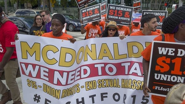 FORT LAUDERDALE, FLORIDA - MAY 23:  People gather together to ask  the McDonald’s corporation to raise workers wages to a $15 minimum wage as well as demanding the right to a union on May 23, 2019 in Fort Lauderdale, Florida.  The nation wide protest at McDonald’s was held on the day of the company’s shareholder meeting.