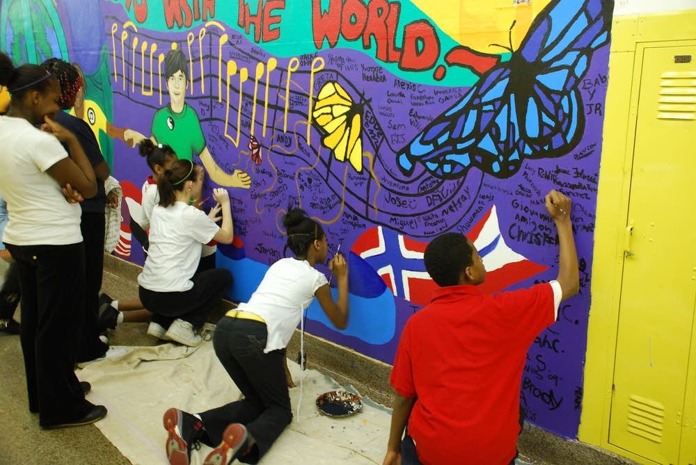 Students work on a mural