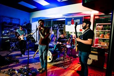 A band performing onstage