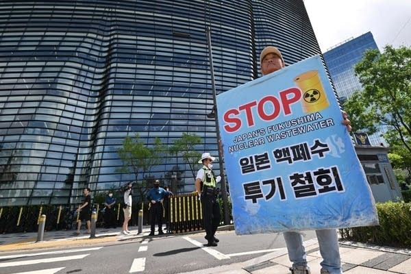 A South Korean man at the Japanese embassy in Seoul, protests over the Fukushima water release.