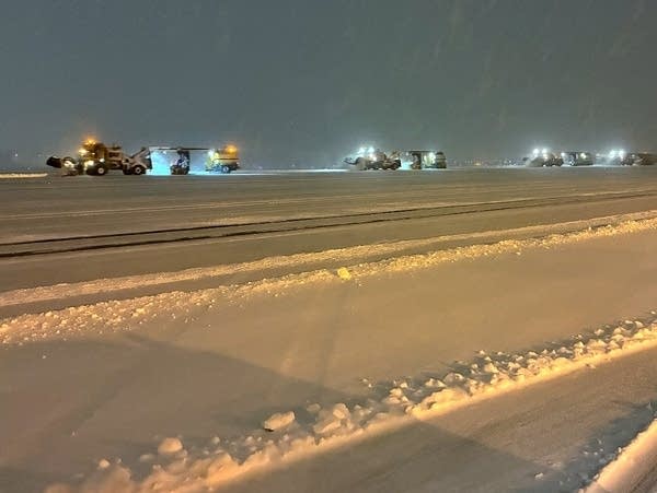 Plows clear snow from runways and tarmacs at an airport