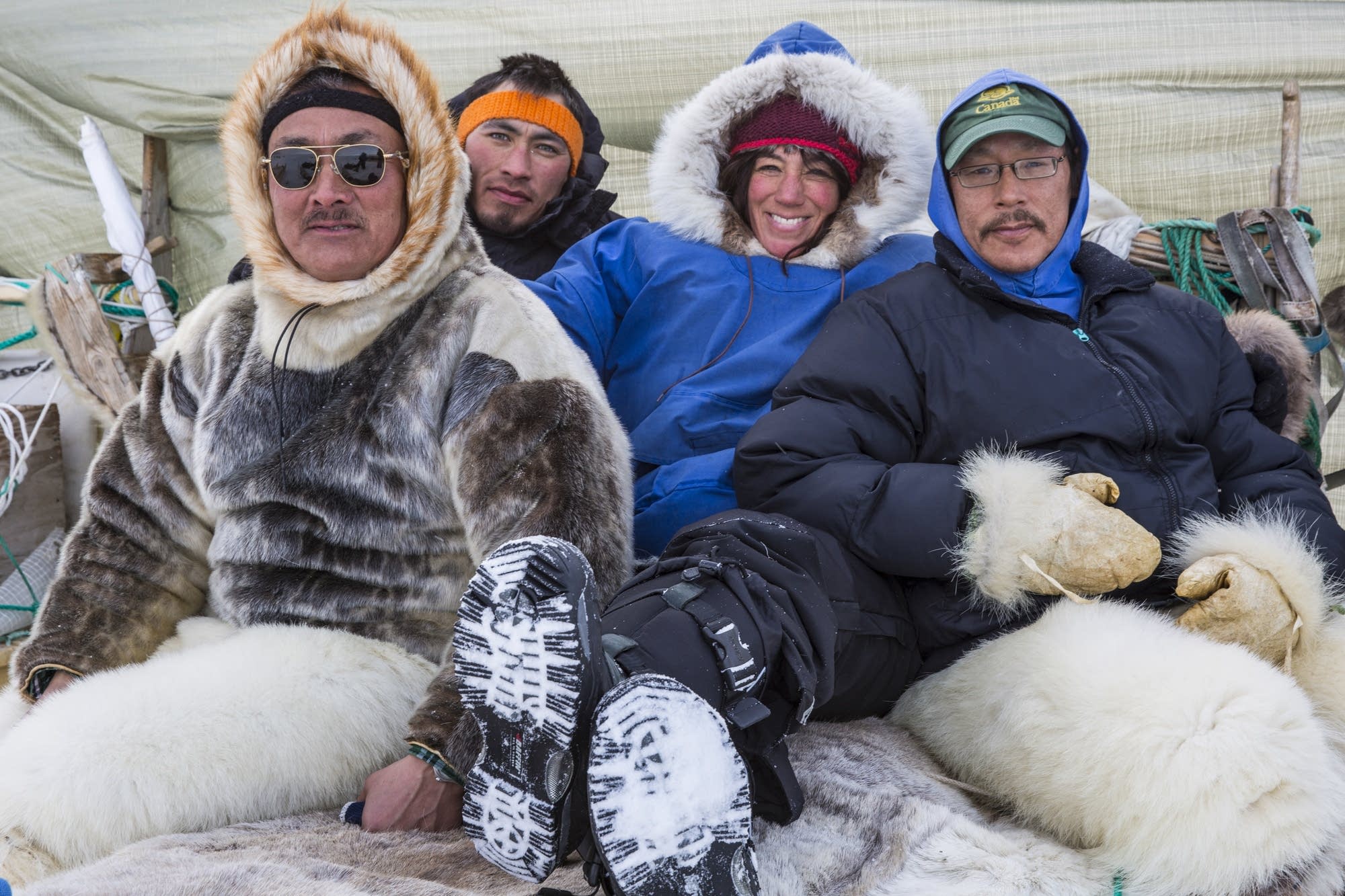 Cristina Mittermeier relaxing with Inuit hunters