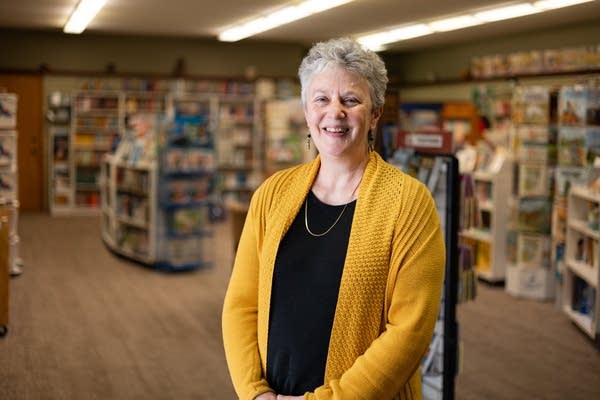 woman stands in store 